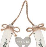 White wedding horseshoe giftware by Widdop & Co with a hanging heart, perfect for wedding decor or keepsake.