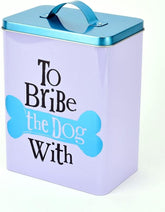 White, black, and metallic aqua blue dog treat storage tin by Widdop & Co, 22.5cm, with humorous "to bribe the dog" design.