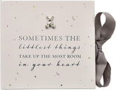 Widdop & Co Bambino baby photo album holding 50 4x6 prints, featuring a classic design for storing cherished baby photos.