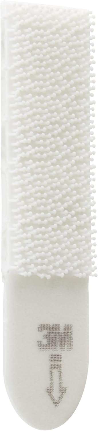 3M Command Small Picture Hanging Strips for damage-free wall mounting, shown attached to a framed photo.