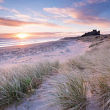 Abacus Cards Bamburgh Beach Castle and Sand Dunes birthday greeting card with colorful beach scene illustration.