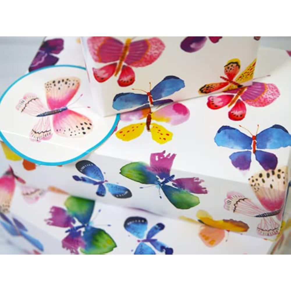 Abacus Cards butterfly-themed gift wrap with two sheets and matching tags, displayed alongside a greeting card.