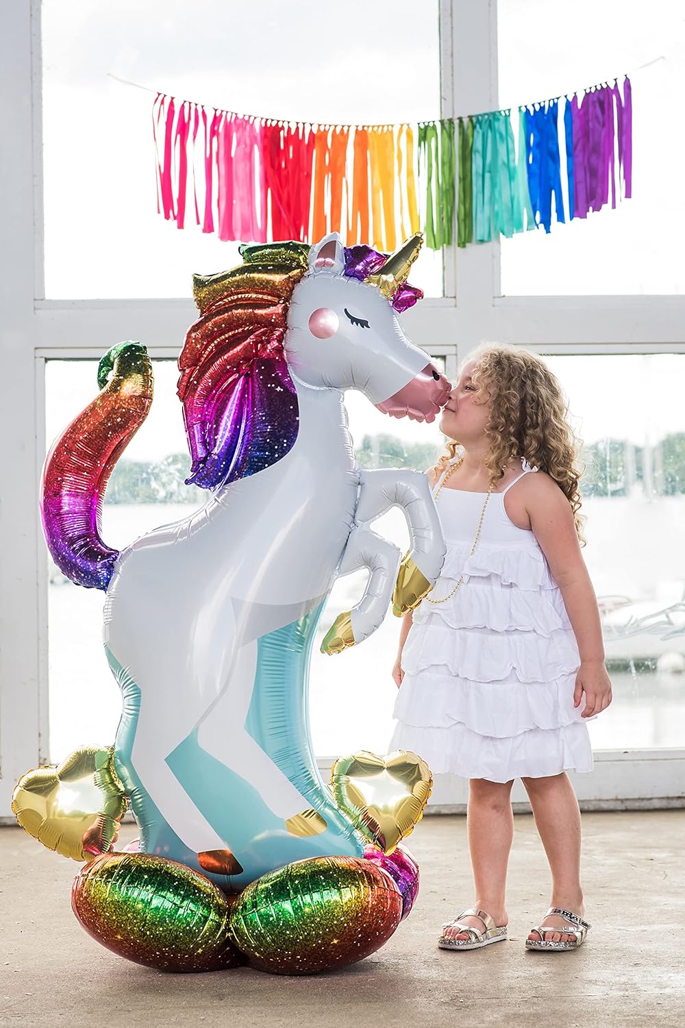 Anagram unicorn foil balloon with colorful unicorn design, shiny metallic surface, and festive appearance for celebrations