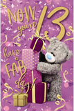 Carte Blanche 13th birthday bear stacking gifts greeting card with colorful illustrations and cheerful design.