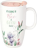 Carte Blanche travel mug, a sleek ceramic mug with a comfortable handle, designed for on-the-go drinking.