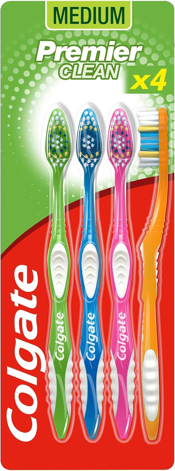 A white Colgate Premier Clean toothbrush 4-pack for oral care, with soft bristles and ergonomic handles.