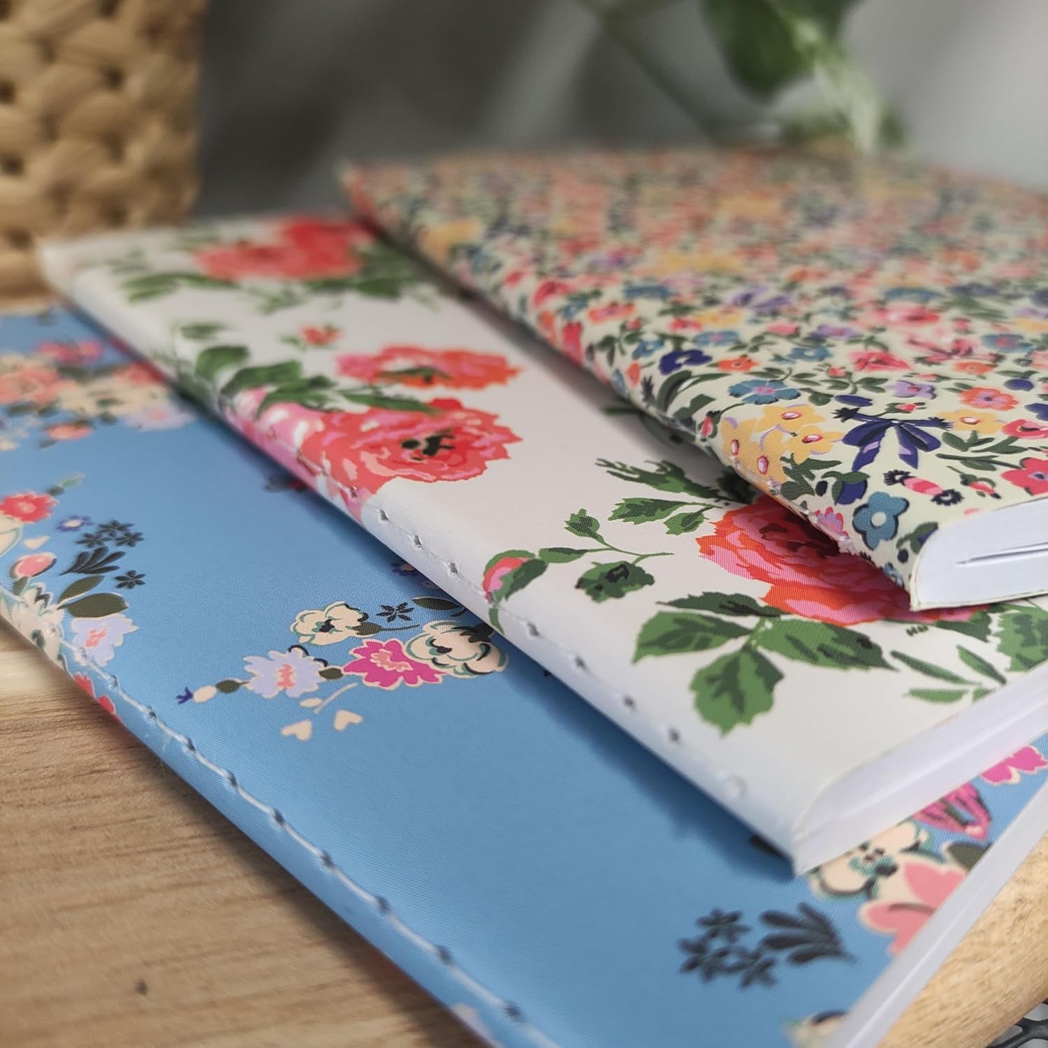 Set of three Cath Kidston floral print notebooks by GBCC, featuring mixed floral designs for stationery and writing.