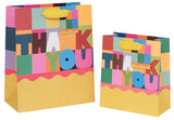 Glick Thank You medium gift bag with checkered pattern, perfect for gift packaging and expressing gratitude.