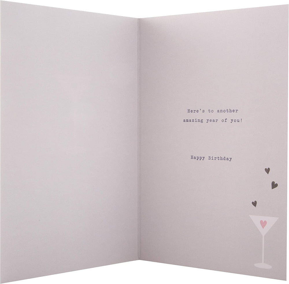 Hallmark birthday card featuring a cocktail glass design and "Happy Birthday Daughter" message, stylish and festive.