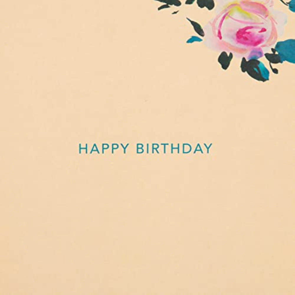 Hallmark birthday card with an elegant floral design, featuring colorful flowers and decorative accents for a friend's birthday celebration.