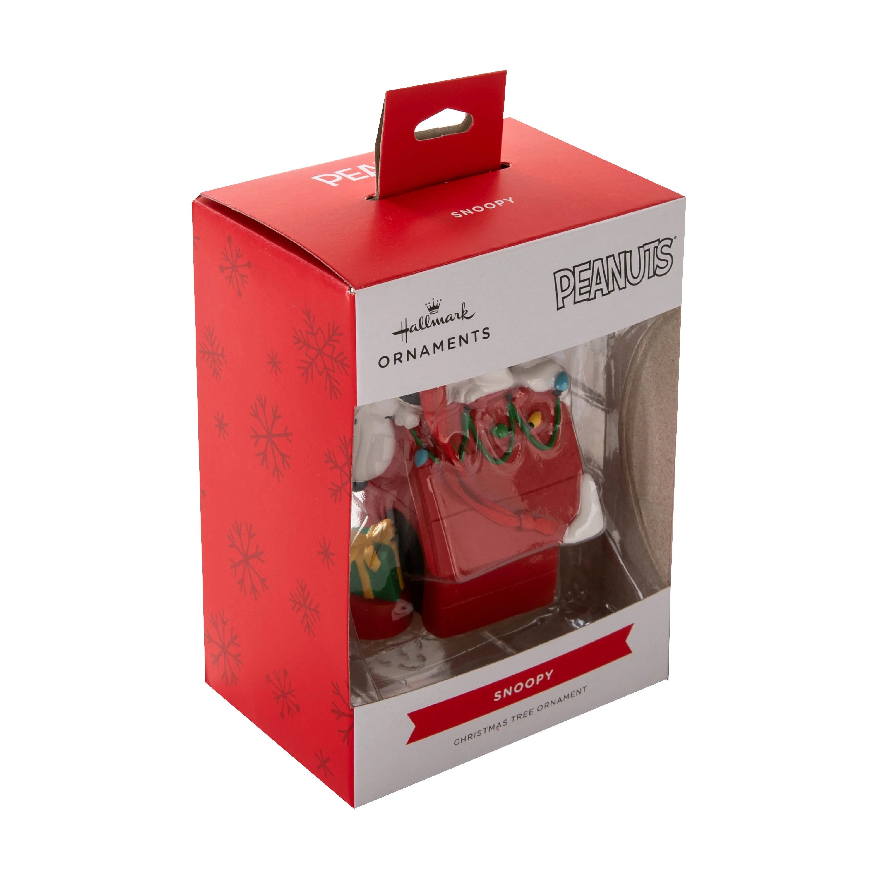 Hallmark Peanuts Snoopy on doghouse Christmas ornament, festive holiday decoration featuring Snoopy from the Peanuts comic strip.