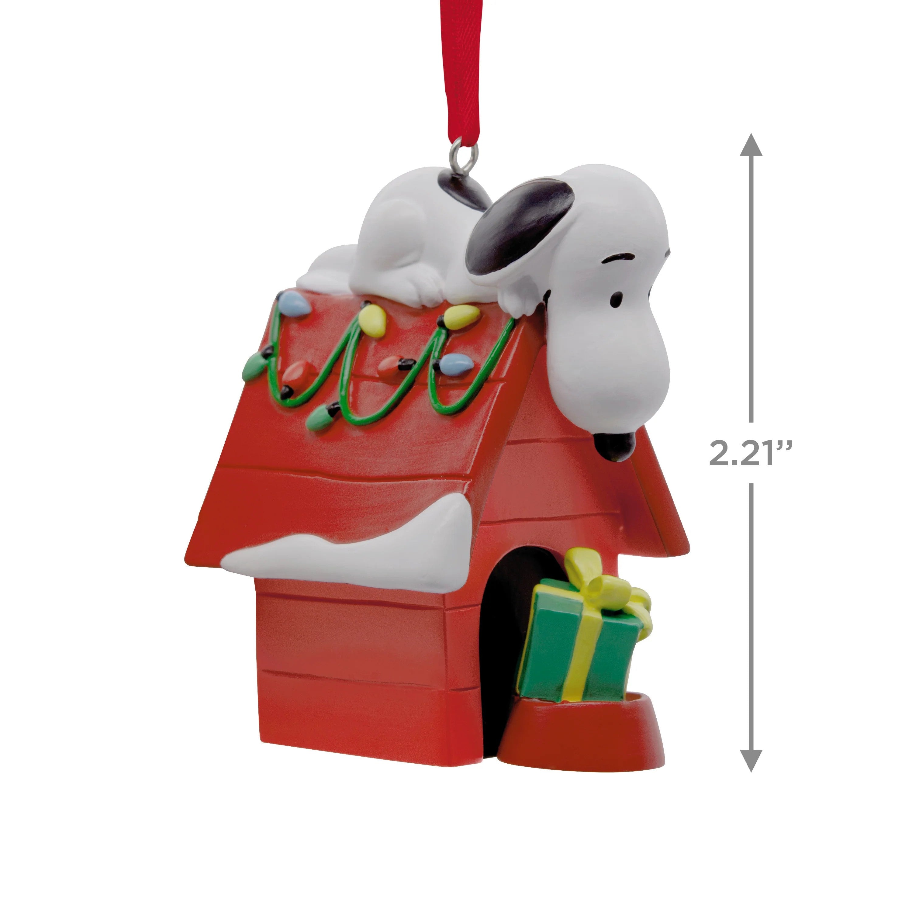 Hallmark Peanuts Snoopy on doghouse Christmas ornament, festive holiday decoration featuring Snoopy sitting on his doghouse.