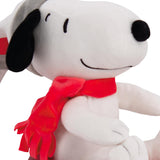 Hallmark Snoopy Christmas tree topper featuring a festive red and white Peanuts design atop a decorated Christmas tree.