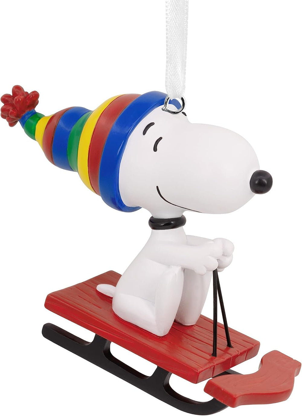 Hallmark Peanuts Snoopy on Sled Christmas hanging ornament, festive decoration featuring Snoopy for holiday decor.
