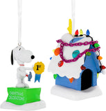Hallmark Peanuts Snoopy ornament, resin hanging Christmas decoration with festive design and detailed Peanuts character imagery.