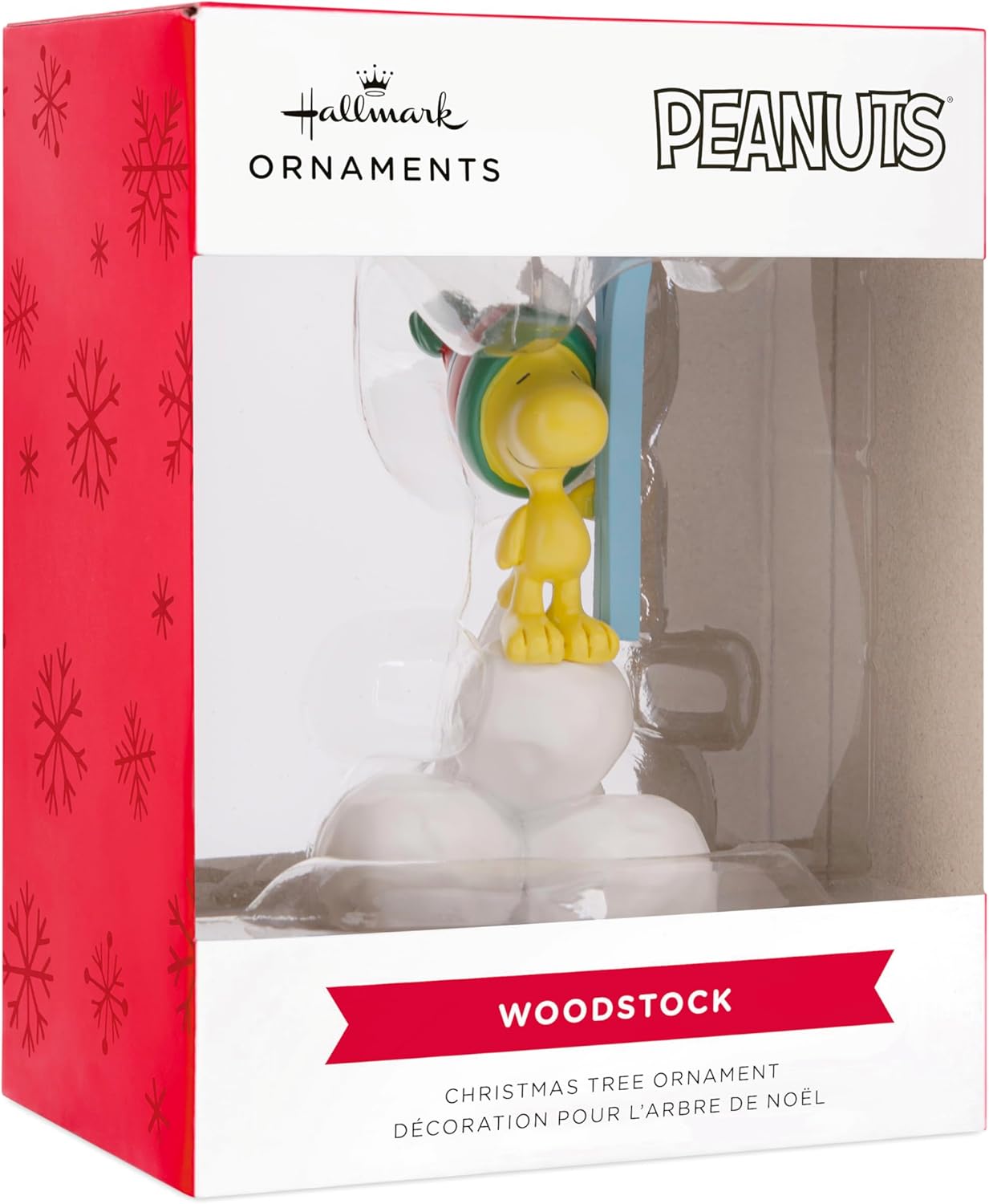 Hallmark Woodstock Peanuts resin Christmas ornament hanging on a decorated tree.