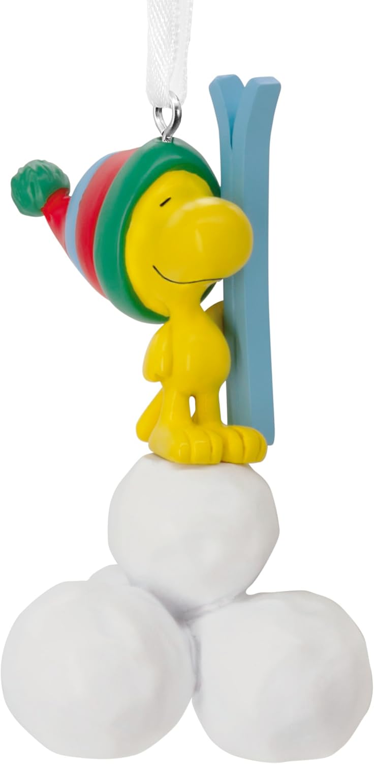 Hallmark Woodstock Peanuts resin Christmas tree ornament hanging on a decorated tree branch