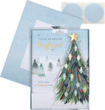 Hallmark boxed Christmas greeting card for boyfriend featuring a classic winter scene with a decorated tree design.
