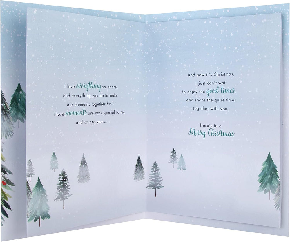 Hallmark boxed Christmas greeting card for boyfriend featuring a classic winter scene with a decorated tree design.