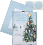 Hallmark boxed Christmas greeting card for fiancé featuring a classic winter scene with a decorated tree design.