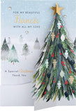 Hallmark boxed Christmas greeting card for fiancée featuring a classic winter scene with a decorated tree design.