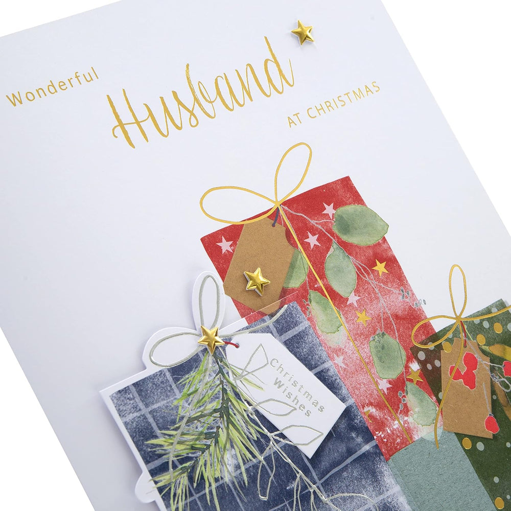 Hallmark boxed Christmas greeting card for husband featuring traditional wrapped gifts design with festive holiday imagery.