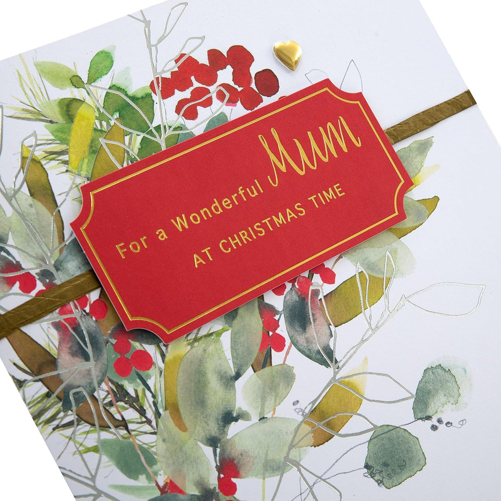 Hallmark Christmas greeting card featuring a classic seasonal foliage design with mums, in a boxed festive holiday card.