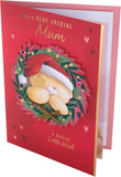 Hallmark Christmas greeting card for mum featuring heartfelt festive message, open design with festive holiday motifs.