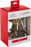 Hallmark Harry Potter Dobby the Elf Christmas ornament hanging on a tree, detailed holiday decoration featuring Dobby from Harry Potter.