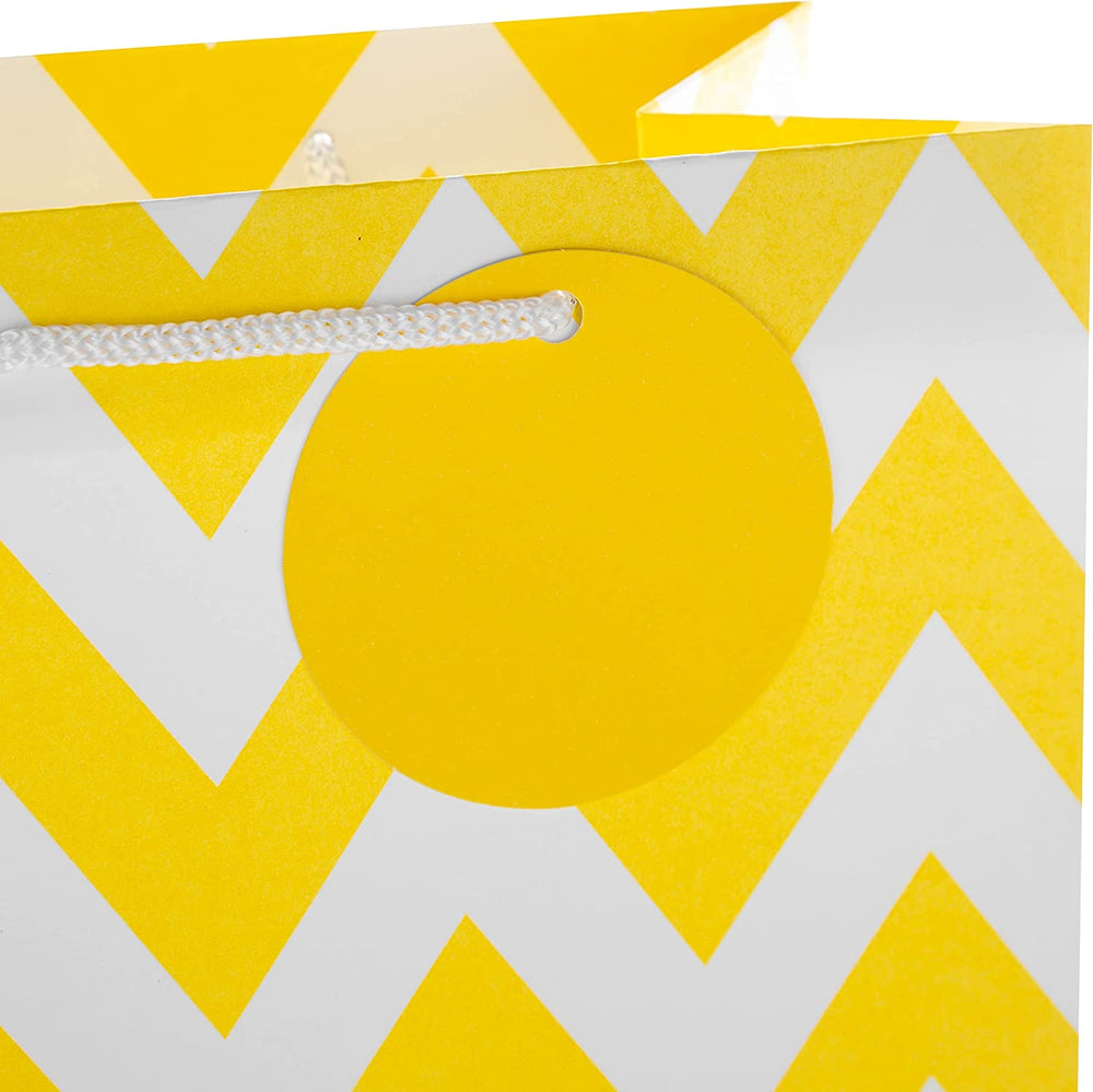 Hallmark gift bag and bottle bag bundle with large, medium, and bottle-sized bags in yellow and white designs.