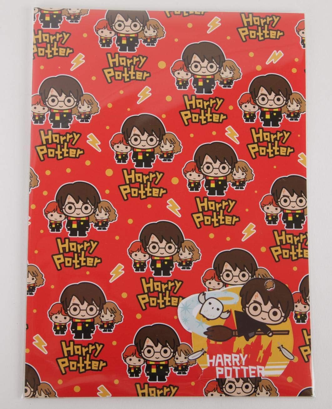 Hallmark Harry Potter gift wrap with two sheets and two matching gift tags, featuring magical Harry Potter-themed designs.