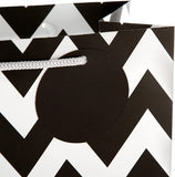 Hallmark medium gift bag with contemporary black designs, suitable for multiple occasions, featuring sturdy handles and stylish packaging.