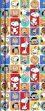 Hallmark Peanuts gift wrap featuring Snoopy, Charlie Brown, and the Peanuts gang with colorful cartoon characters on paper.