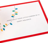 Hallmark 3D pop-up Snoopy and Woodstock Christmas card with festive holiday scene, featuring colorful holiday characters and designs