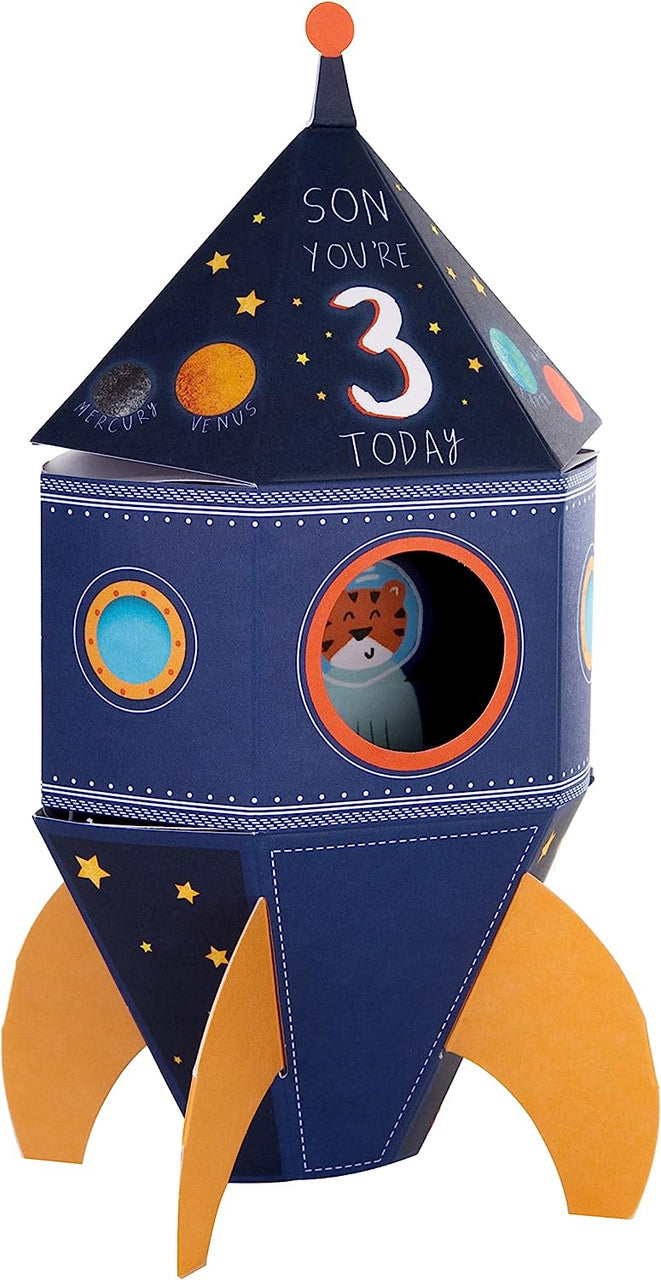 Hallmark 3rd birthday greeting card for son featuring a 3D pop-up rocket design with colorful illustrations.