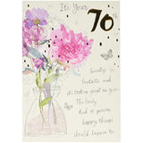 Hallmark 70th birthday greeting card with a classic embossed floral design, featuring elegant floral patterns and festive accents.