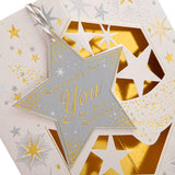 Hallmark birthday greeting card featuring a 3D design with a hanging star attachment, colorful and festive for celebrating birthdays.