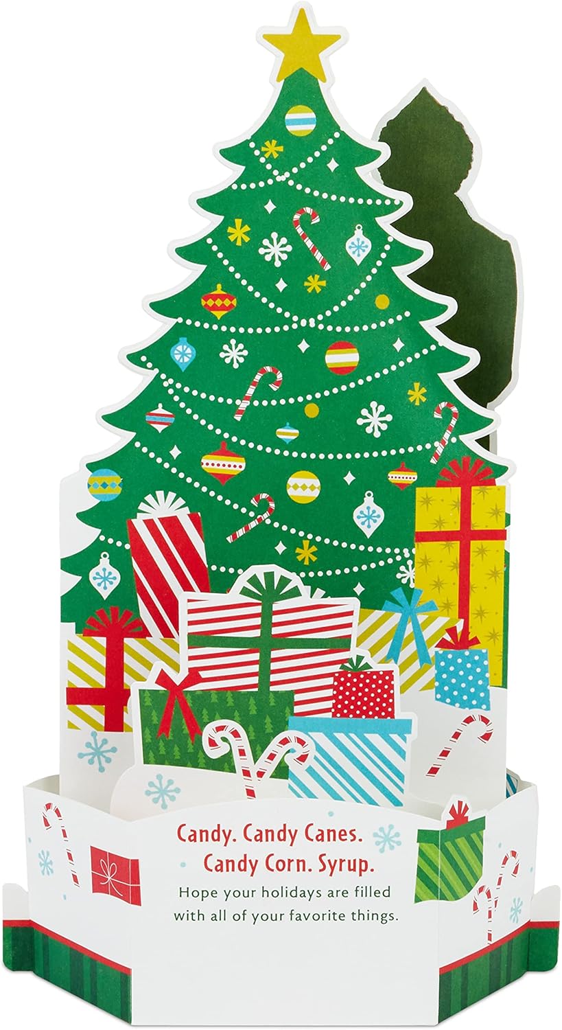 Hallmark Buddy the Elf musical light-up 3D pop-up Christmas greeting card with festive holiday design.