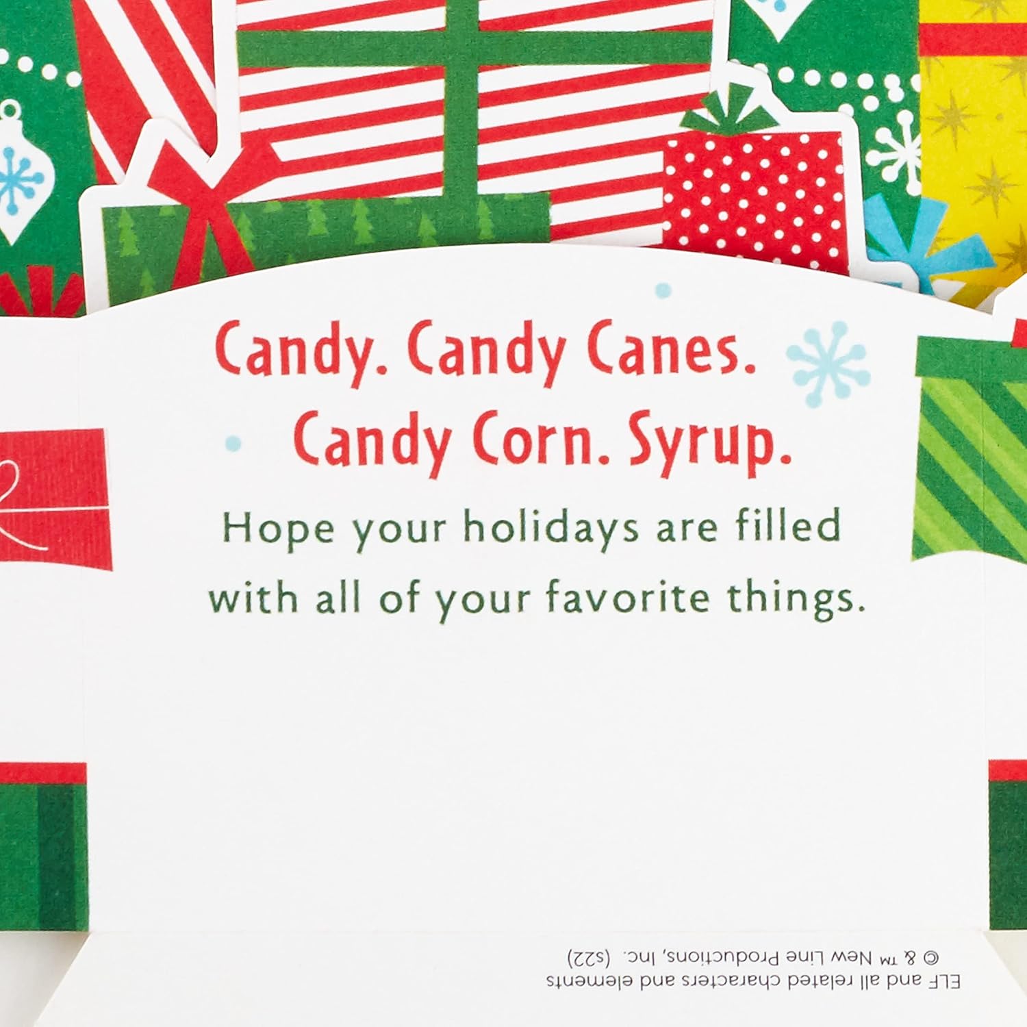 Hallmark Buddy the Elf musical light-up 3D pop-up Christmas card with festive holiday design and detailed elf illustration.