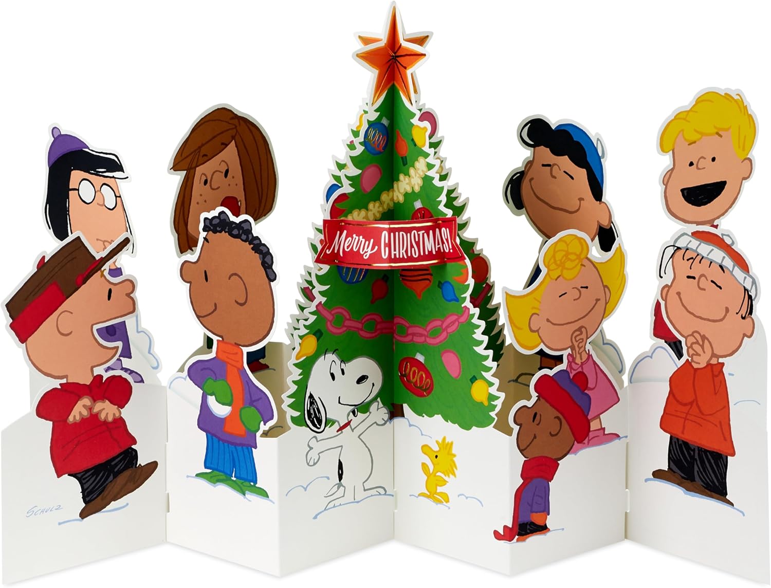 Hallmark Christmas greeting card featuring 3D pop-up Peanuts characters Charlie Brown, Snoopy, and a Christmas tree.