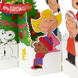 Hallmark Christmas card featuring 3D pop-up Peanuts Charlie Brown, Snoopy, and Christmas tree design for holiday greeting cards.