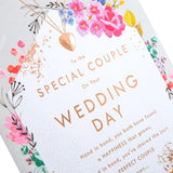 Hallmark wedding congratulations greeting card with classic floral and text design, featuring elegant floral illustrations and heartfelt message
