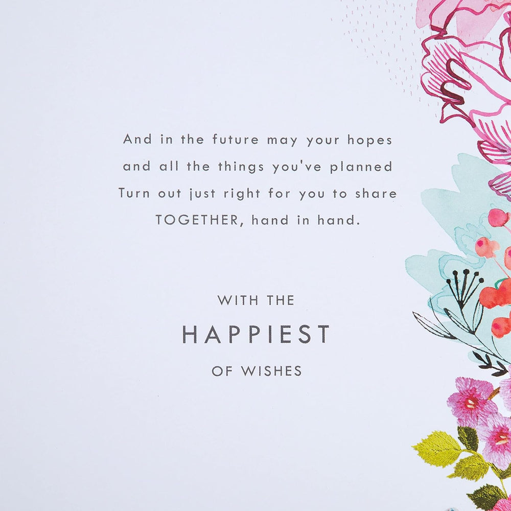 Hallmark wedding congratulations card with floral and text design, featuring elegant floral illustrations and heartfelt message.