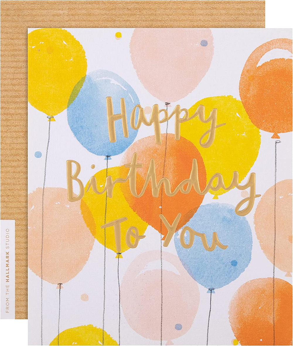 Hallmark embossed birthday greeting card with textured text design and colorful floral accents, perfect for celebrating special occasions.