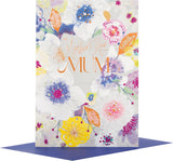 Hallmark "Love You So Much Mum" Mother’s Day card with floral design and heartfelt message inside.