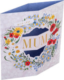 Hallmark 3D pop-up flower wreath Mother’s Day card with vibrant design and elegant greeting for mums.