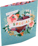 Hallmark Someone Special die cut floral greeting card with colorful floral design on front.