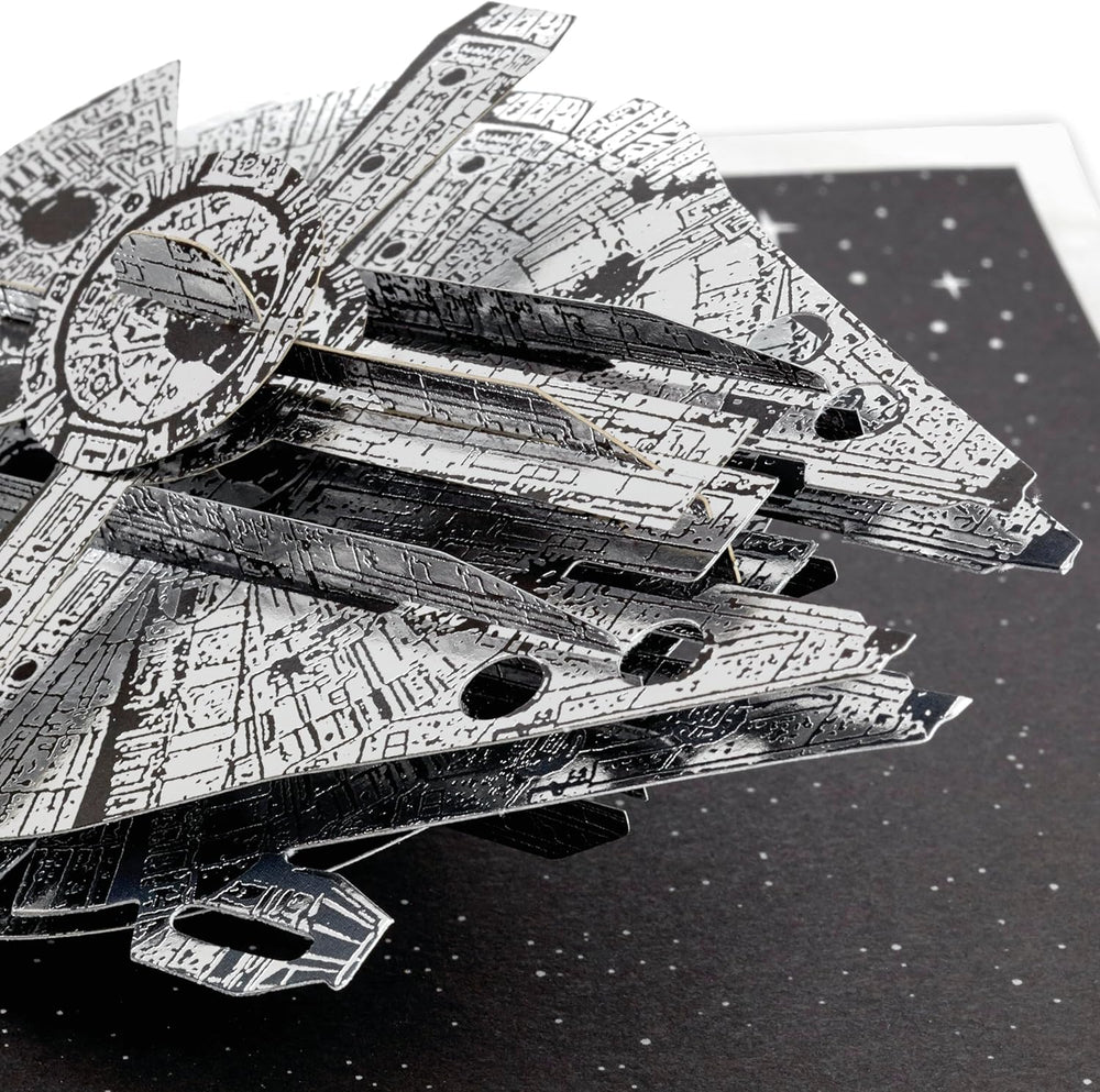 Hallmark 3D pop-up Star Wars Millennium Falcon space-themed silver birthday greeting card with detailed design.