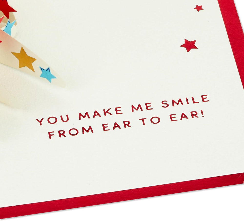 Hallmark 3D and pop-up Disney Mickey Mouse greeting card with colorful characters and festive design for special occasions