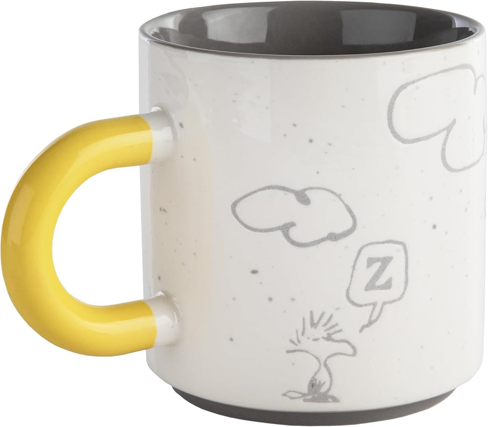 Hallmark Snoopy and Woodstock ceramic mug in grey with a yellow handle, 440ml capacity, featuring cartoon character illustrations.